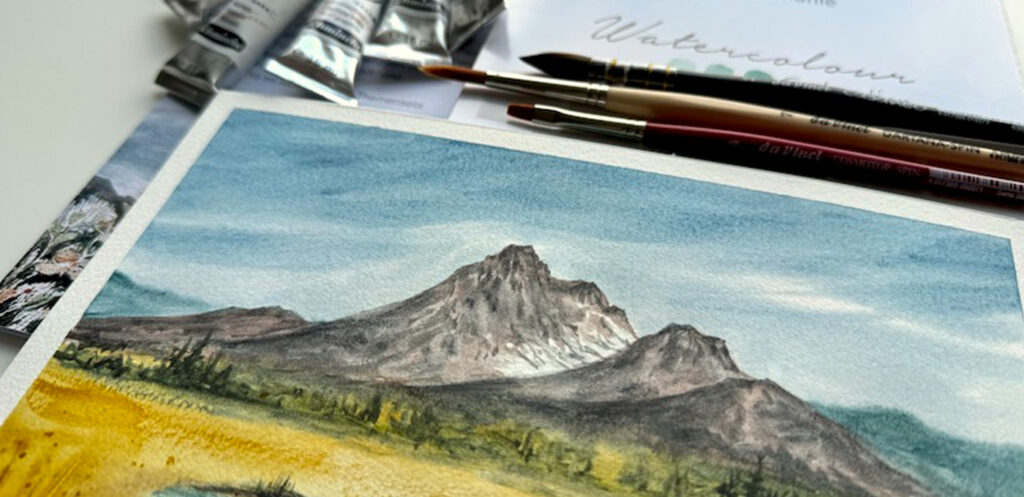 Aquarellmalerei mit dramatischen Berglandschaften