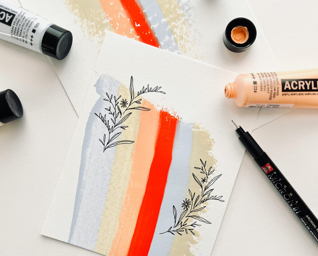 Mixed Media Bild aus Acrylfarben im Hintergrund und floralen Motive mit Permanentmarker